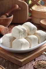 white tofu on wooden table