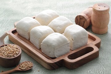 Fototapeta na wymiar white tofu on wooden table