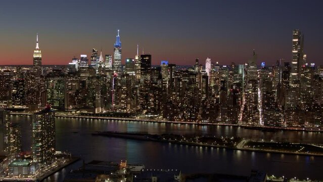 aerial time lapse of new york city skyline at night