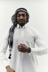 Arabic entrepreneur captures a self-portrait against an isolated white background, radiating...