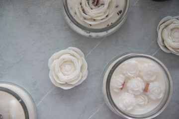 Candles with lavender and flowers in the interior
