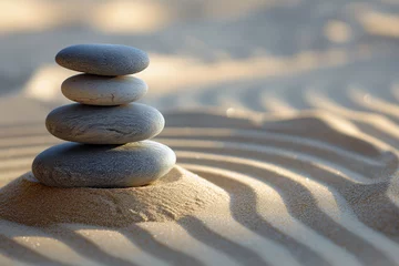 Foto op Aluminium Stenen in het zand Stacked zen stones sand background, art of balance