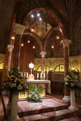 Castalla, Alicante, Spain, February 13, 2024: Vertical view of the altar of the Church of Our Lady of the Assumption. Gothic style. Century XVI. Castalla, Alicante, Spain