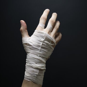 bandaged finger is a visual indication of damage or injury. Putting a bandage on your finger can be a tool for preventing and treating injuries. This image may create a feeling of sensitivity or skill