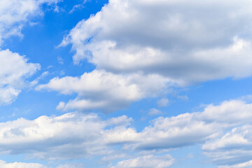 Naklejka na ściany i meble Blue sky and white clouds. Beauty of nature