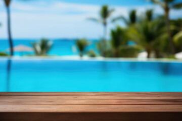 Tropical blurred background with empty table top near swimming pool on sunny day. Copy space.