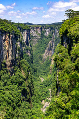 Cliffs, river and waterfall in Itaimbezinho Canyon
