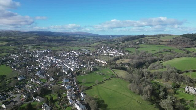 Moretonhampstead, Dartmoor, Devon, England: DRONE VIEWS: The drone flies over the medieval town showing its church, houses & allotments. The town was mentioned in the Domesday Book of 1086AD (Clip 2).
