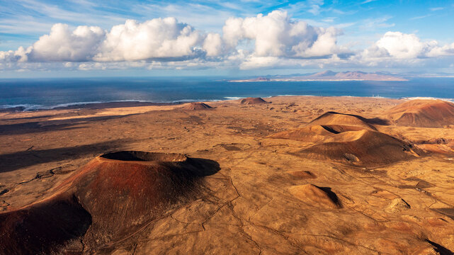 Aerial view from above of the crater Calderon Hondo. Calderon Hondo is a volcanic caldera in the sland of Fuerteventura, Canary Islands.
