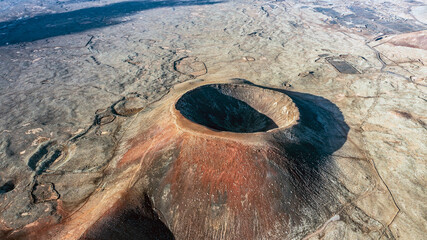 Aerial view from above of the crater Calderon Hondo. Calderon Hondo is a volcanic caldera in the...