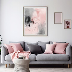 Grey sofa with pink pillows and blanket against white wall with abstract art poster. Interior design of modern living room.