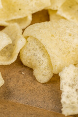 crispy potato chips with spices on the table