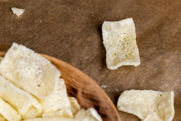 crispy potato chips with spices on the table