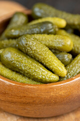 green pickled cucumbers on the table
