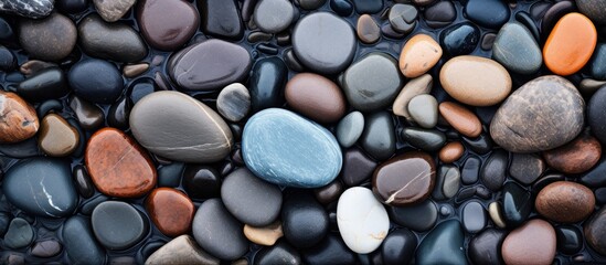 Smooth round pebbles texture background Pebble sea beach close up dark wet pebble and gray dry pebble High quality photo. Creative Banner. Copyspace image - Powered by Adobe