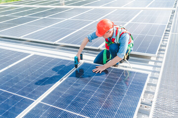 Smart Professional male engineer or expert technician working, installing and fixing to maintenance at solar panel farm system, Renewable energy and alternative sustainable photovoltaic sunlight power