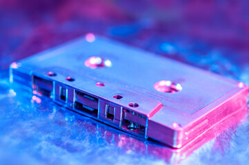 Retro audio compact cassette tape for recorder or player in bright acid neon colors. Vintage Style...