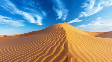 Fototapeta na wymiar Majestic Desert Dunes Under Clear Blue Skies: The Beauty of Arid Landscapes