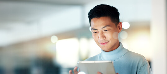 Asian man with tablet, smile and scroll, thinking and reading email, review or article at startup....