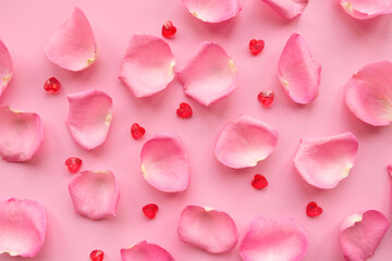Pink rose petals on pink background. Valentine or wedding abstract background