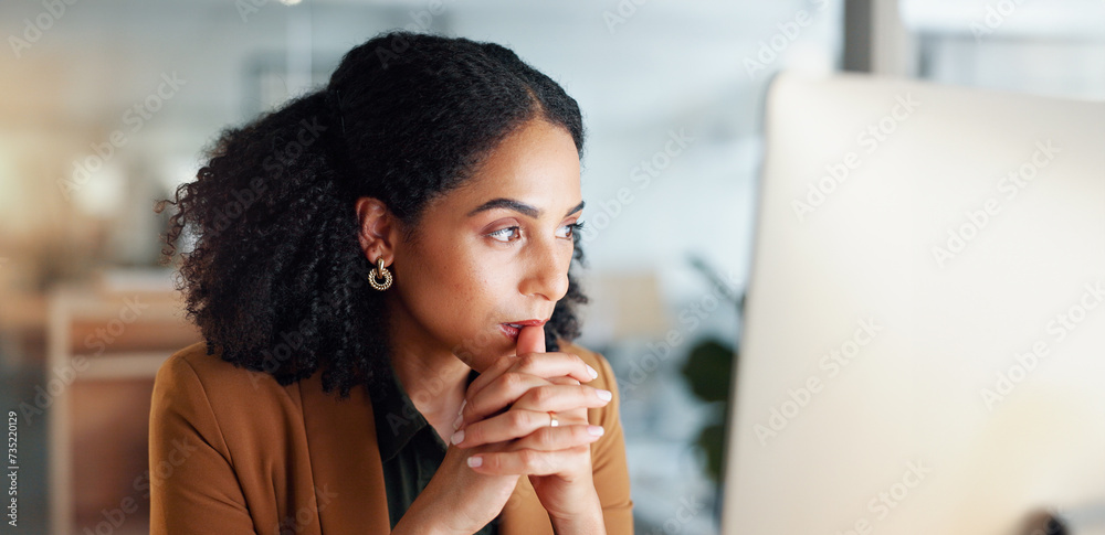 Poster woman at computer in office, thinking and reading email, feedback review or web article at digital a
