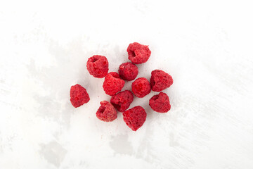 Dried freeze dried raspberries on the table, top view. Dehydrated raspberry berries. Clever Storage...