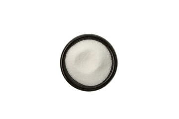 Glucono Delta-Lactone (GDL) in black dish on white background, top view. Gluconolactone, White...