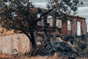 destroyed houses in an abandoned city without people in Ukraine