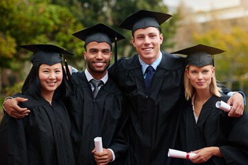 Portrait, graduation and certificate with student friends outdoor on campus for university or...