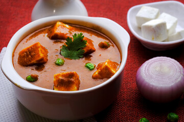 Paneer Butter Masala, served with or without roti and rice, popular indian lunch / dinner menu in weddings or parties.