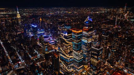 Sparkling glamorous panorama of New York at night. Amazing view of metropolis with beautiful...