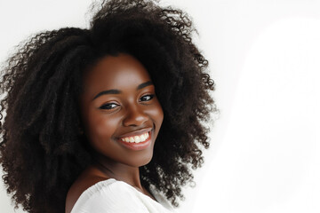 young beautiful woman smiling with big curls