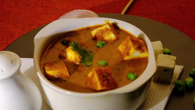 Paneer Butter Masala, served with or without roti and rice, popular indian lunch / dinner menu in weddings or parties.
