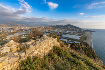 Panoramic shot of the city from the mountain, green landscape of the Turkish area.