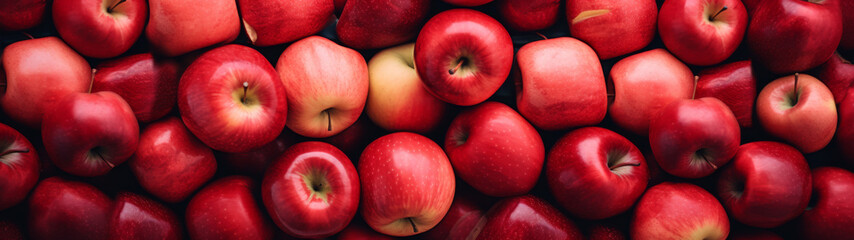Red Apples Piled High with a Deep Shadow Background - obrazy, fototapety, plakaty