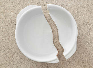 Broken ceramic bakeware dish on kitchen countertop