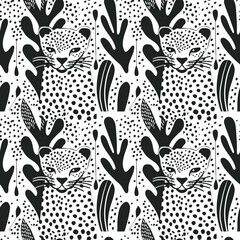 Black and white cartoon seamless pattern with cheetahs.