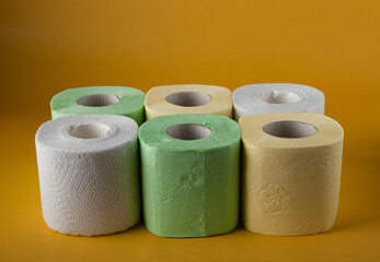 rows of rolls of multicolored toilet paper