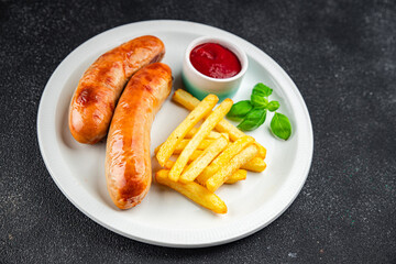 fried sausages and french fries fast food meat and potatoes tasty fresh eating cooking appetizer meal food snack on the table copy space food