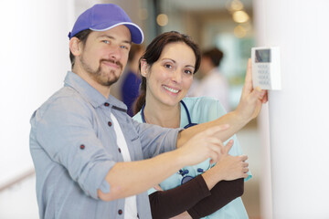 Fototapeta premium portrait of industrial workers and female doctor