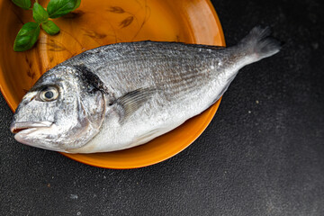 raw fish sea bream seafood fresh cooking snack appetizer meal food on the table copy space food background rustic top view