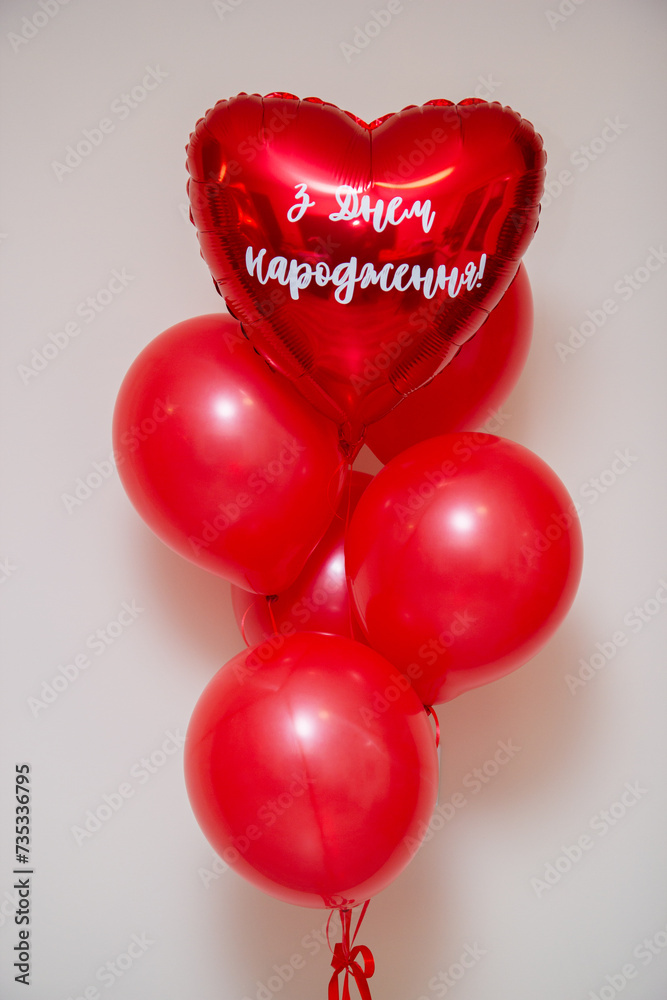 Wall mural red heart shaped balloons