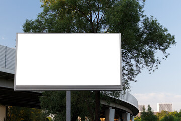 Fototapeta premium Billboard near an overpass near the city. Mock-up.