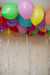 colorful helium balloons on the ceiling
