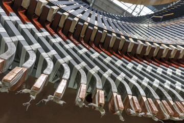 Closeup view of stator winding in electric machine.