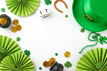 St. Patrick's Day delight: A tapestry of festive cheer. Top view of green hat, shamrocks, golden coins, horseshoe, calendar set, paper props on a white background with space for festive messages - Powered by Adobe