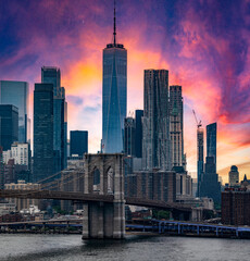 The Brooklyn Bridge at sunset linking the boroughs of Manhattan and Brooklyn in New York City...