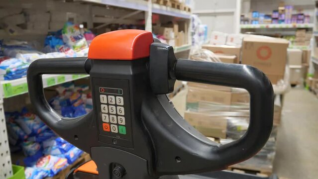 Manual forklift pallet stacker truck equipment at warehouse