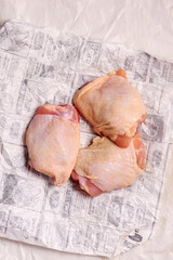 Raw chicken thighs  for roast.style rustic
