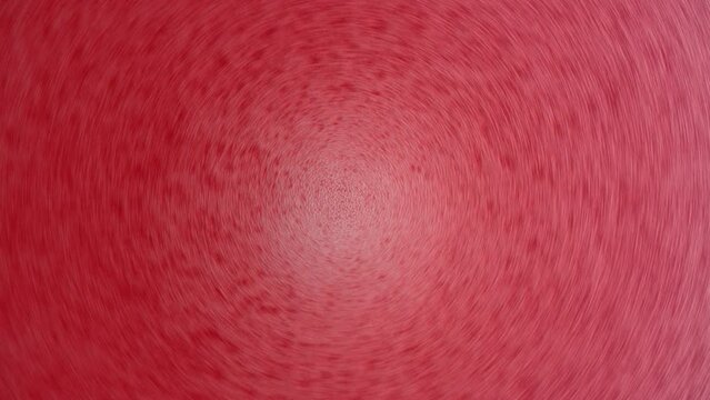 Bubbles on the surface of the drink of red raspberries soda drink on background. Fresh drink of scarlet cranberry or cherry or red currant or viburnum, close up, top view, rotates